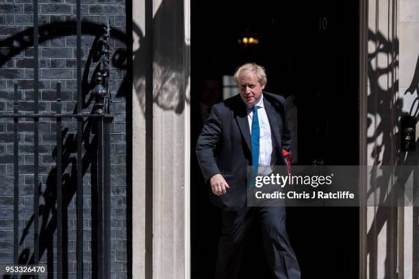 Boris Johnson, Secretary of State for Foreign Affairs, leaves after the first cabinet meeting following the Re-Shuffle at Downing Street on May 1,...