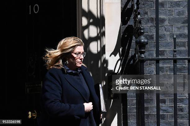 Britain's International Development Secretary and Minister for Women and Equalities Penny Mordaunt leaves after attending the weekly meeting of the...