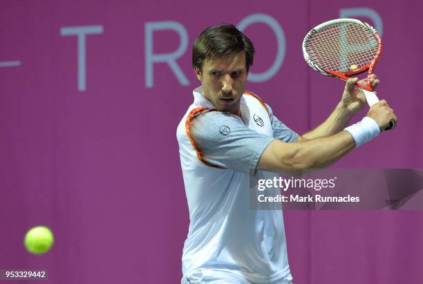 Igor Sijsling of Netherlands in action during his singles match against Bernabe Zapata Miralles of Spain on the fourth day of The Glasgow Trophy at...