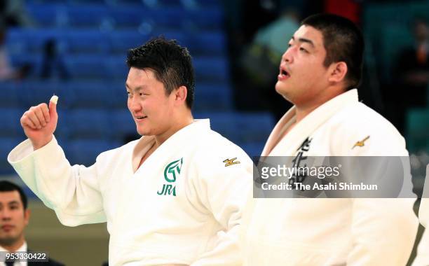 Winner Hisayoshi Harasawa and runner-up Takeshi Ojitani are seen at the medal ceremony after the All Japan Judo Championship at the Nippon Budokan on...