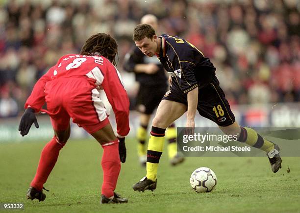 Wayne Bridge of Southampton is challenged by Christian Karembeu of Middlesbrough during the FA Carling Premiership match at the Riverside Stadium in...