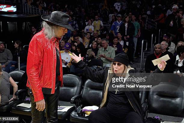 Jim Goldstein talks to Penny Marshall at a game between the Cleveland Cavaliers and the Los Angeles Lakers at Staples Center on December 25, 2009 in...