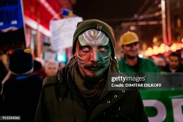 Environmental protesters demonstrate against recent changes in the management plan of the country's Pirin national park to the southwest, that they...