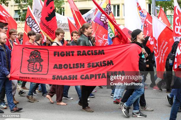 The youth organisation of the governing Social Democratic Party of Germany JuSo with a banner against Racism, Sexism, and capitalism. Several...