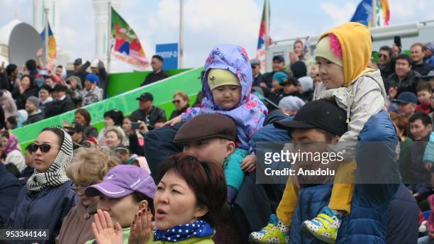 People attend May Day, International Workers' Day celebrations in Astana, Kazakhstan on May 1, 2018.