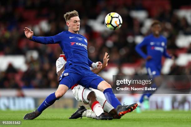 Charlie Brown of CHelsea FC collides with Joseph Olowu of Arsenal FC during the FA Youth Cup Final, second leg match between Arsenal and Chelsea at...