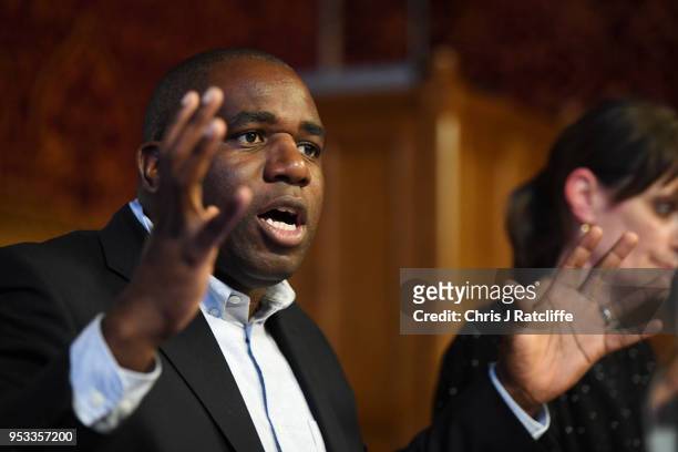 Labour MP David Lammy speaks during a meeting with representatives of the Windrush generation at the House of Commons on May 1, 2018 in London,...