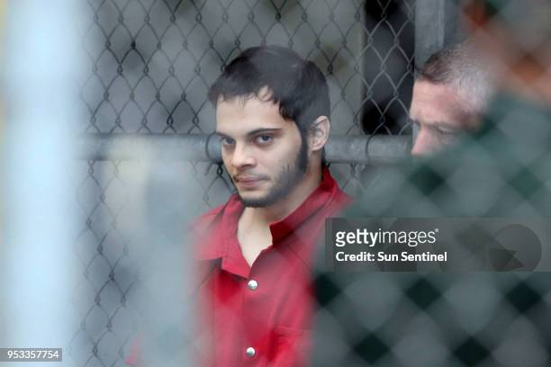 Esteban Santiago is taken from the Broward County main jail as he is transported to the federal courthouse Monday, Jan. 9, 2017 in Fort Lauderdale,...