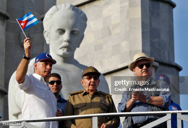 President of Cuba Miguel Díaz-Canel greets Cubans along with the current first secretary of the Communist Party of Cuba , Raúl Castro and president...