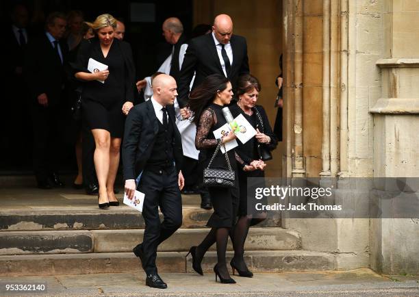 Wife Jackie Wilkins and family leave St Luke's & Christ Church after the memorial held for Ray Wilkins on May 1, 2018 in London, England.