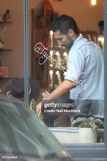 Millie Mackintosh seen visiting Hugo Taylor at his new eyewear store Taylor Morris in Wetsbourne Grove before heading to a local hair salon Show on...