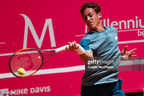 Bjorn Fratangelo from USA returns a ball to Roberto Carballes Baena from Spain during their Millennium Estoril Open ATP Singles 1st round tennis...