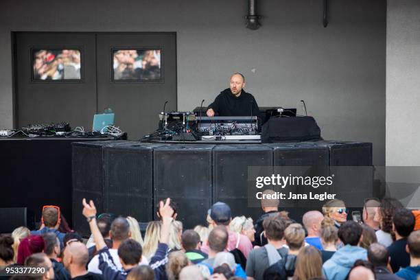 German Techno musician Paul Kalkbrenner performs live on stage during a concert at the Aufbau Haus on May 1, 2018 in Berlin, Germany.