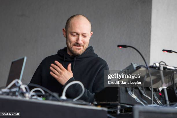 German Techno musician Paul Kalkbrenner performs live on stage during a concert at the Aufbau Haus on May 1, 2018 in Berlin, Germany.