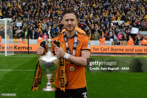 Barry Douglas of Wolverhampton Wanderers with the Sky Bet Championship trophy during the Sky Bet Championship match between Wolverhampton Wanderers...