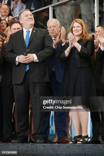 Secretary of State Mike Pompeo and his wife Susan Pompeo are welcomed to the State Department during a ceremony in the lobby of the Harry S. Truman...