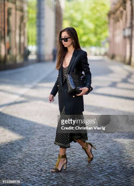 Nadja Ali wearing Lala Berlin dress, Jimmy Choo heeled sandals, Balmain for H&M blazer, Liebeskind Berlin bag, Celine sunglasses is seen on May 1,...
