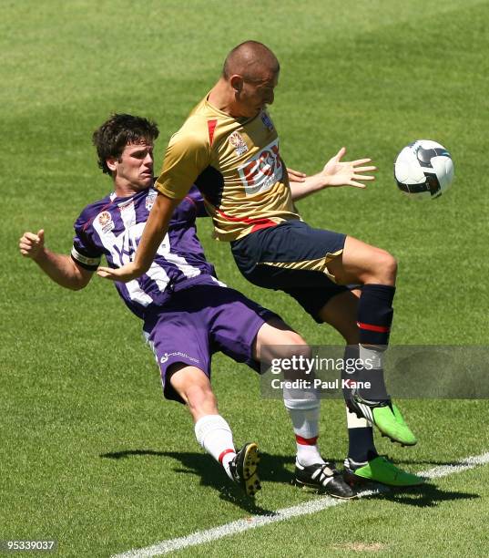 Steven Hesketh of the Glory and Mirjan Pavlovic of the Jets contest the ball during the round 17 National Youth League match between the Perth Glory...