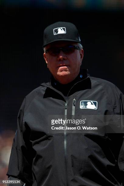 Umpire Brian Gorman stands on the field during the first inning between the San Francisco Giants and the Los Angeles Dodgers at AT&T Park on April...