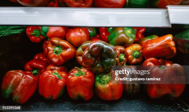 red peppers - peruvian red pepper stock pictures, royalty-free photos & images