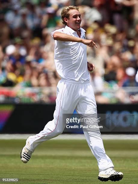 Stuart Broad of England celebrates taking the wicket of Hashim Amla of South Africa for 2 runs during day one of the second test match between South...