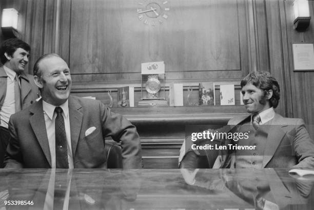 English soccer player Alan Ball Jr with English former soccer player and manager Bertie Mee after signing with Arsenal FC, UK, 23rd December 1971.