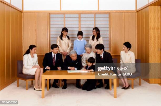 The japanese royal family, emperor Akihito, seated third left, accompanied by empress Michiko, seated third right, and crown prince Naruhito, seated...