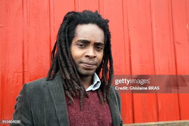 Marvin Victor, Haitian writer, painter and movie maker during the festival Etonnant Voyageur on June 12, 2011 in Saint Malo, France.