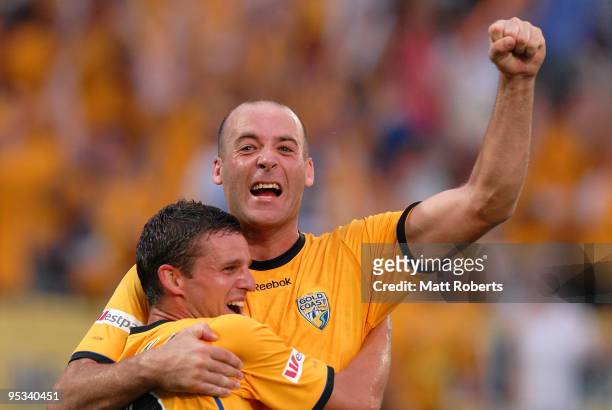 Kristian Rees of United celebrates his second goal with Jason Culina of United during the round 21 A-League match between Gold Coast United and...