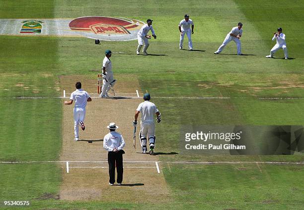 Graeme Swann of England catches out Ashwell Prince of South Africa off the bowling of James Anderson of England during day one of the second test...