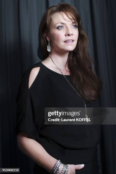 Amanda Tapping session portrait at 'Hotel du Louvre' on october 11, 2012 in Paris, France.