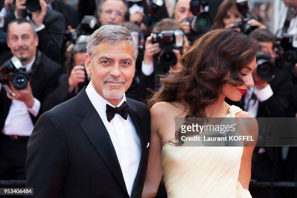 George Clooney and his wife Amal Clooney attend the 'Money Monster' premiere during the 69th annual Cannes Film Festival at the Palais des Festivals...