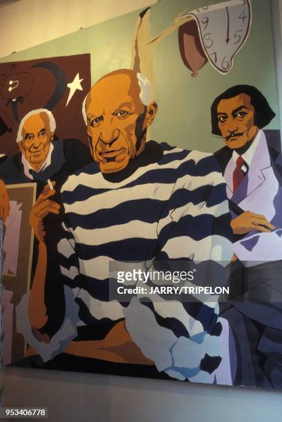 Peinture représentant les peintres espagnols Juan Miro, Salvador Dali et Pablo Picasso, dans une boutique de souvenirs à Barcelone, Espagne.