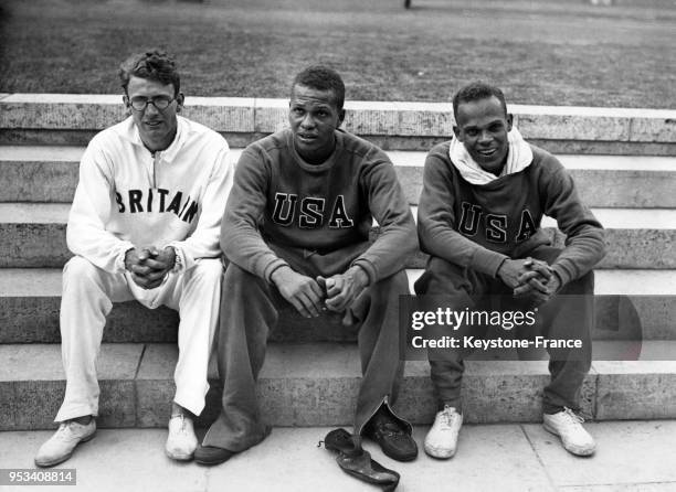 Godfrey Brown , Archie Williams et James LuValle remportent l'épreuve olympique de course à pied du 400 m le 7 août 1936 à Berlin, Allemagne.