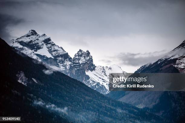 mountains surrounding the village of fulpmes, tyrol, austria - neustift im stubaital stock pictures, royalty-free photos & images