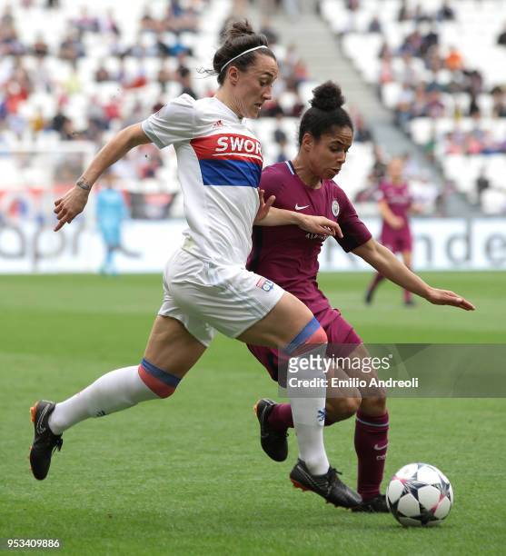 Lucy Bronze of Olympique Lyonnais is challenged by Demi Stokes of Manchester City Women during the UEFA Women's Champions League, Semi Final Second...