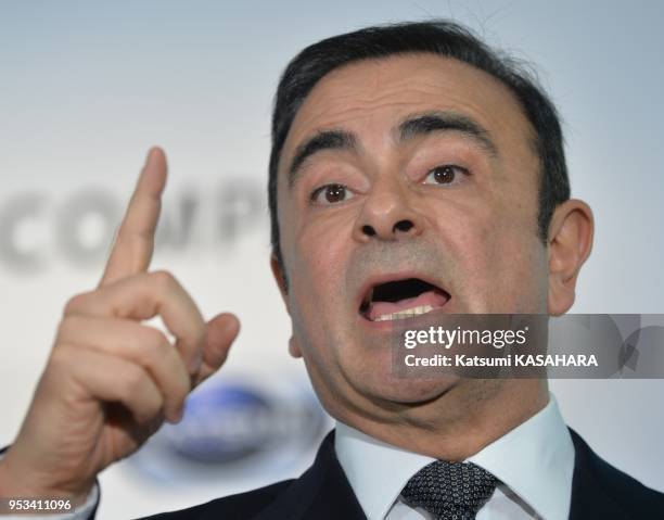 Carlos Ghosn, President of Nissan Motor Corp., speaks to reporters during a press conference which the company announced its financial results on May...