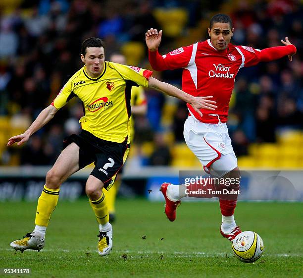 Don Cowie of Watford and Lewis McGugan of Nottingham Forest battle for the ball during the Coca Cola Championship match between Watford and...