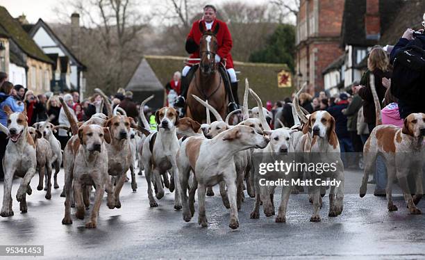 Jonathon Seed, Joint Master and Huntsman with the Avon Vale Hunt, leads the hounds and the horses for their traditional Boxing Day hunt, December 26,...