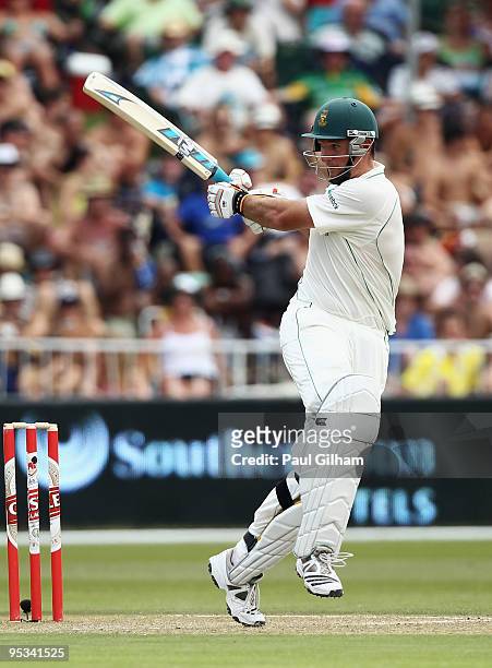 Graeme Smith of South Africa hits out during day one of the second test match between South Africa and England at Kingsmead Stadium on December 26,...