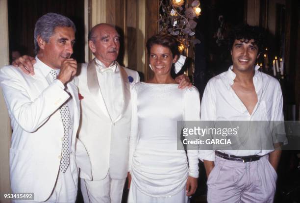 Jean-Loup Dabadie et Julien Clerc au mariage de Eddie Barclay avec Cathy Esposito en juin 1984, France.