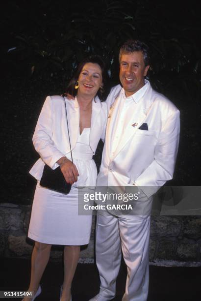 Stéphane Collaro et sa femme au mariage de Eddie Barclay avec Cathy Esposito en juin 1988, France.