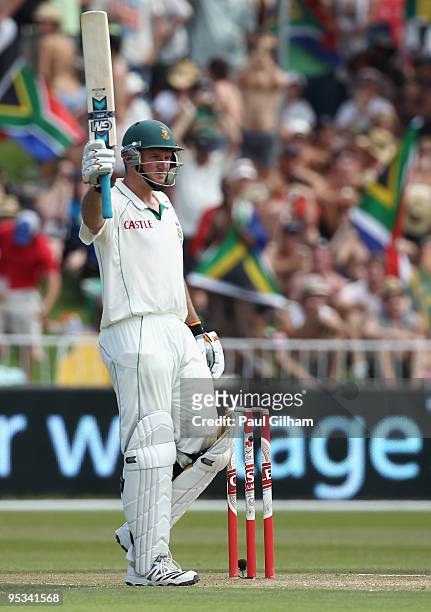 Graeme Smith of South Africa celebrates making fifty runs during day one of the second test match between South Africa and England at Kingsmead...