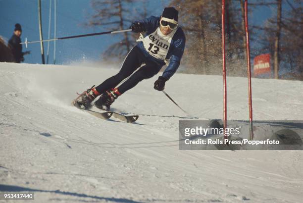 Austrian alpine skier Heinrich Messner pictured in action during competition in the Men's giant slalom event, part of the 1970-71 FIS Alpine Ski...