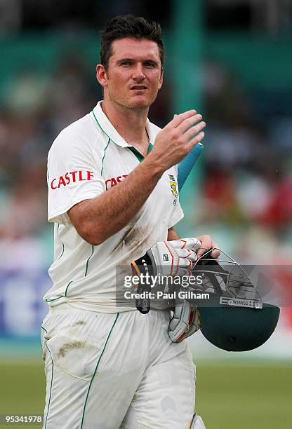 Graeme Smith of South Africa looks dejected as he walks off after being run out by Alastair Cook of England during day one of the second test match...