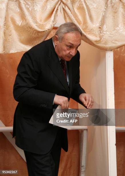 Leader of Georgia's breakaway Abkhazia region Sergei Bagapsh exits a voting booth at a polling station in Sukhumi on December 12, 2009. Georgia's...