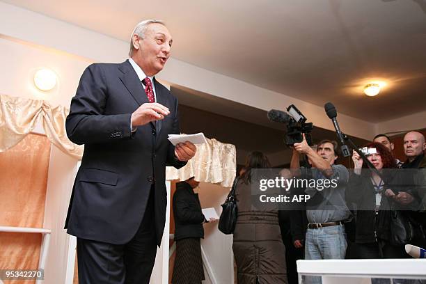 Leader of Georgia's breakaway Abkhazia region Sergei Bagapsh goes to place his ballot in a ballot-box at a polling station in Sukhumi on December 12,...