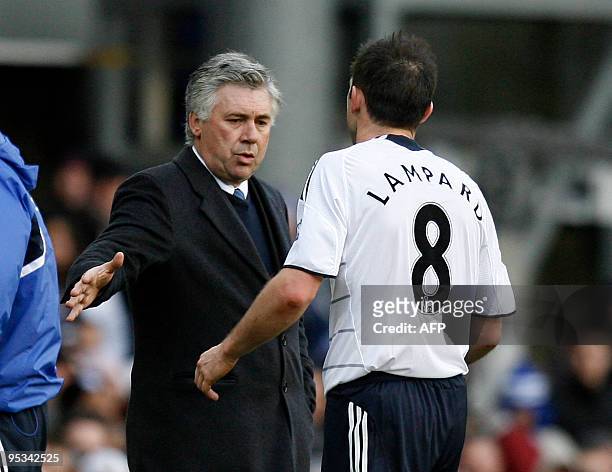 Chelsea's Italian manager Carlo Ancelotti shakes Frank Lampard's hand after he is substituted during the English Premier League football match...