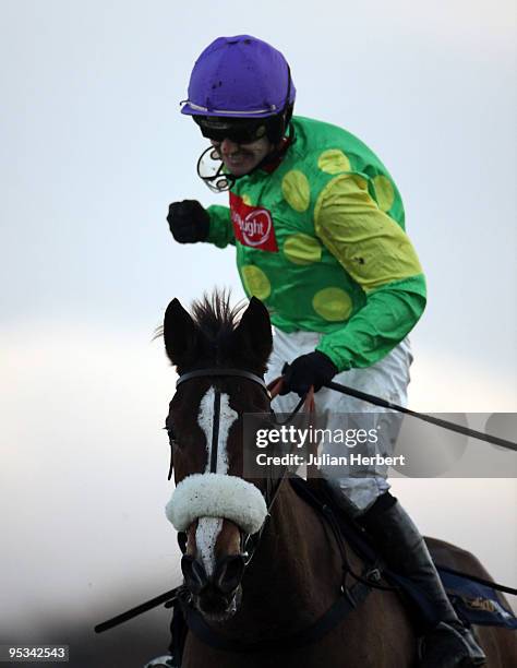 Ruby Walsh shows his delight after Kauto Star won The William Hill King George VI Steeple Chase Race run at Kempton Park on December 26, 2009 in...