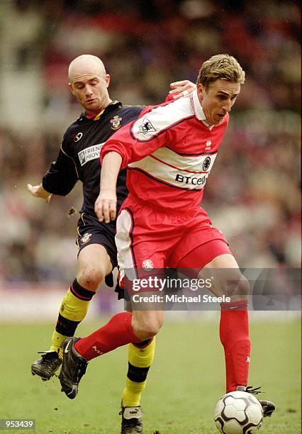 Alen Boksic of Middlesbrough is challenged by Chris Marsden of Southampton during the FA Carling Premiership game at the Riverside Stadium in...